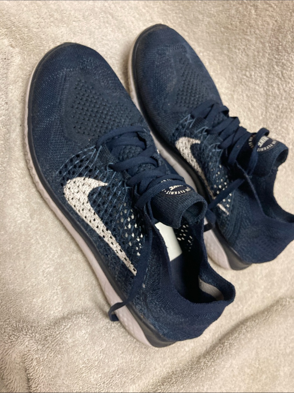 Nike Women’s Navy Free Run Flyknit Sneakers with White Swoosh